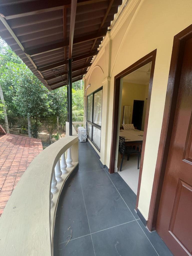 Kalpadiyil Hotel Balarampuram Bagian luar foto